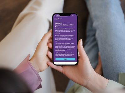 SPOA on phone held by child and adult
